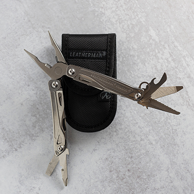 LEATHERMAN<sup>&reg;</sup> Multi-Tool Sidekick<sup>&reg;</sup> - This handy pocket-sized tool has it all! Features include stainless steel body, spring-action needle nose and regular pliers, wire cutters, 420HC combo and serrated knife, saw, wood/metal file, ruler, small and medium screwdriver, Phillips screwdriver, bottle and can opener, wire stripper, carabiner bottle opener accessory and a removable pocket clip. Includes nylon carrying case.