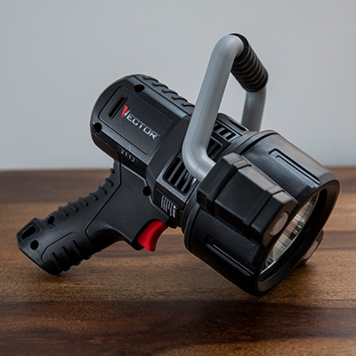 VECTOR<sup>&reg;</sup> Rechargeable Li-Ion LED Spotlight - 
 Built to last and ready to go anywhere this powerful ultra bright LED spotlight reaches 750 Lumens with a continuous 7 hour run time. Features a Li-Ion rechargeable battery with charging micro USB port and charging status LED indicator. Other features include a tough durable housing, heavy duty bezel and pistol grip ergonomic handle. Includes AC cube, micro USB cable and is UL/ ETL certified. 