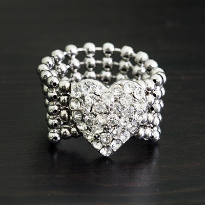 GUESS<sup>&reg;</sup> Stretch Pavé Heart Ring - This cute silver-tone band features a pavé crystal heart. Ring is nickel and lead free with a stretch band that fits up to size 7-8.