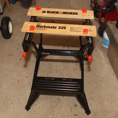 BLACK & DECKER<sup>&reg;</sup> Workmate<sup>&reg;</sup>  225-Portable Project Center and Vise - The Workmate<sup>&reg;</sup> 225 is the perfect addition to your home shop! You can use it as a workbench, a bench tool stand or a sawhorse. It features adjustable rear jaws which provide versatility and stability when clamping materials. Also, the Workmate’s legs fold under to provide lower height for larger projects and adjustable swivel pegs to allow you to hold almost anything!